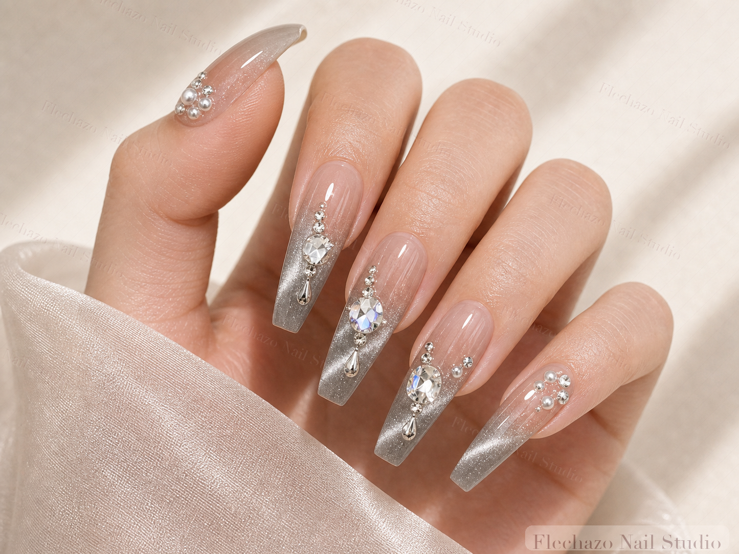 Silver Gray Crystal Cat Eye Press-On Nails worn on a model hand