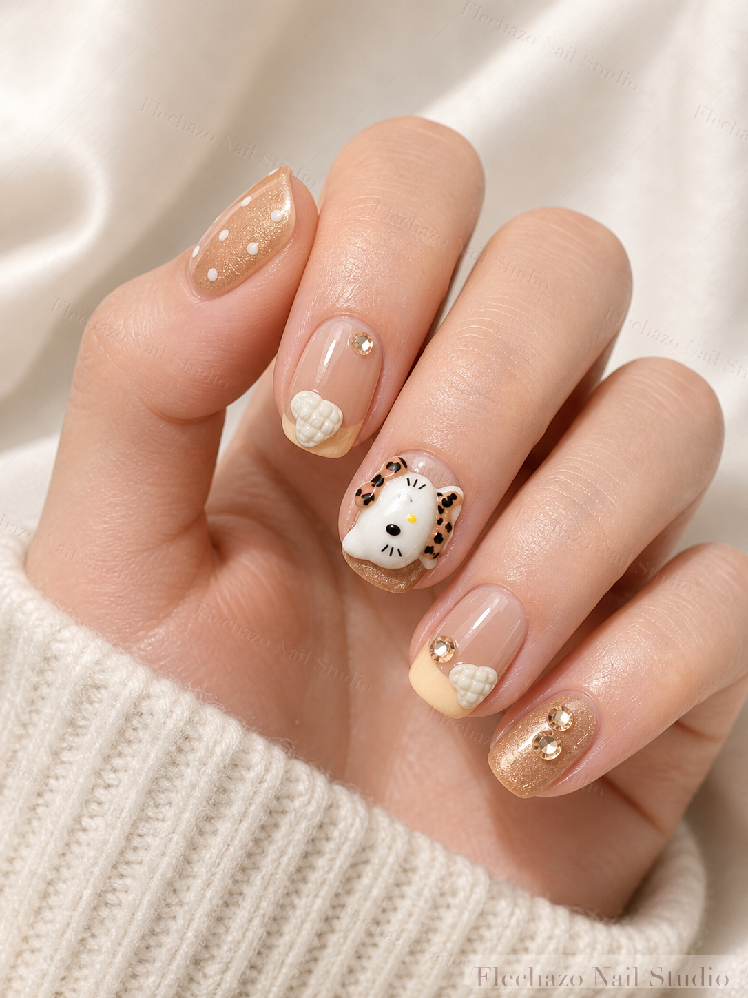 Caramel Cream Snowman Winter Press-On Nails worn on a model hand