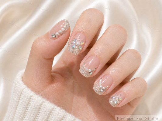Nude Silver Butterfly Rhinestone Press-On Nails worn on a model hand