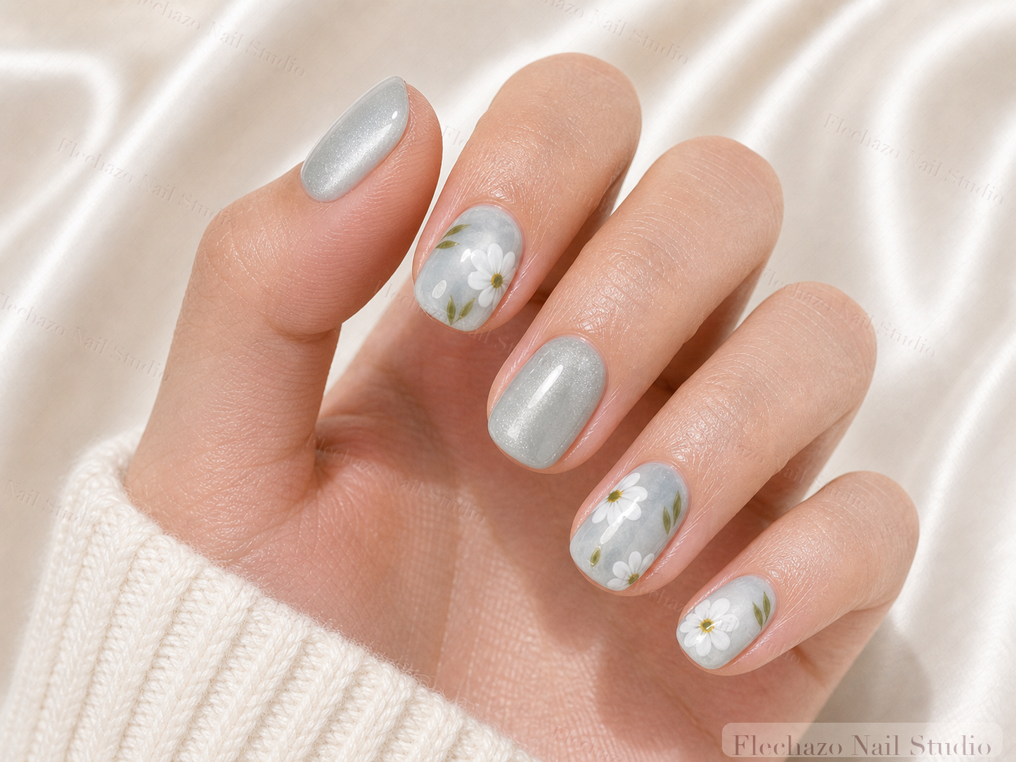 White Green Botanical Floral Press-On Nails worn on a model hand