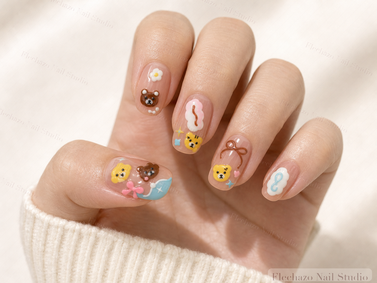 Cute Bear Pastel Press-On Nails worn on a model hand