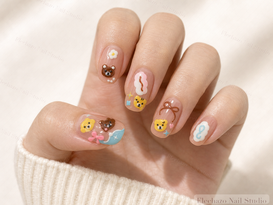 Cute Bear Pastel Press-On Nails worn on a model hand