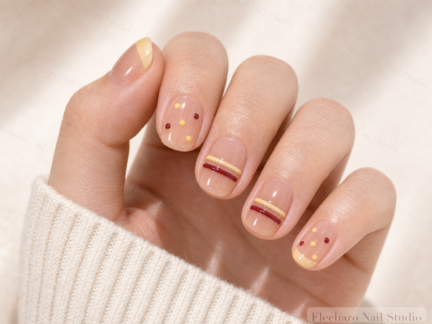 Lemon Yellow Stripe Dot French Press-On Nails worn on a model hand