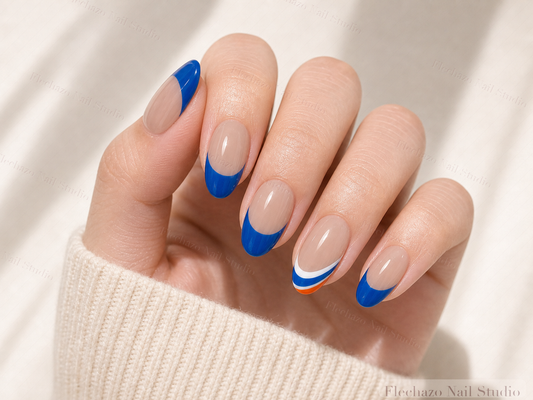 Nude Bold Royal Blue French Press-On Nails worn on a model hand