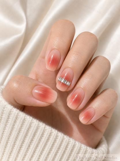Coral Red Aura Crystal Stripe Press-On Nails worn on a model hand