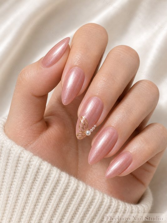 Mauve Nude Gold Butterfly Press-On Nails worn on a model hand