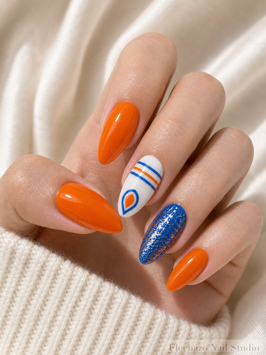 Orange Blue Sporty Graphic Press-On Nails worn on a model hand