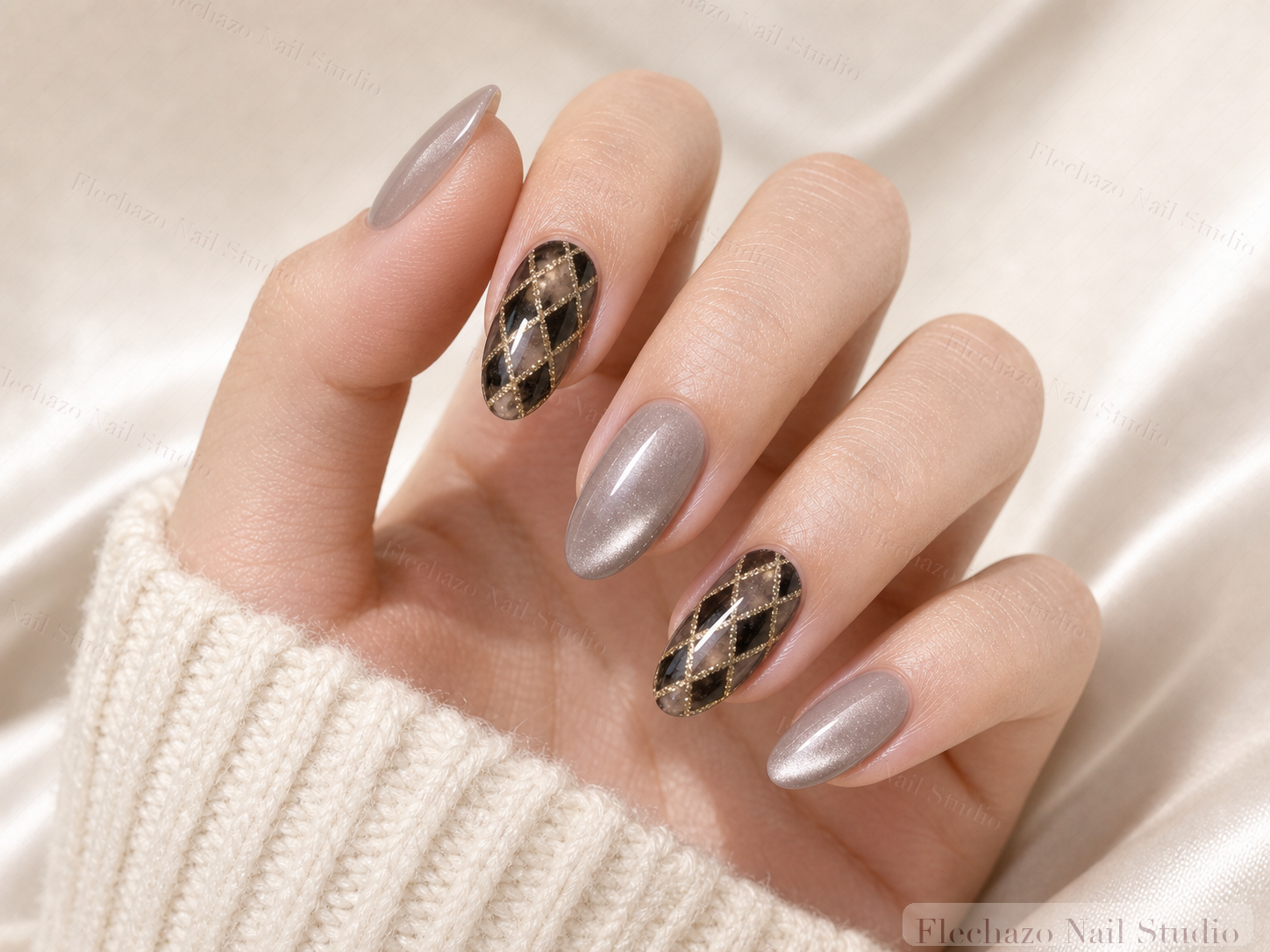 Taupe Gold Leopard Shimmer Press-On Nails worn on a model hand