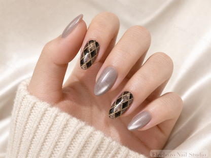 Taupe Gold Leopard Shimmer Press-On Nails worn on a model hand