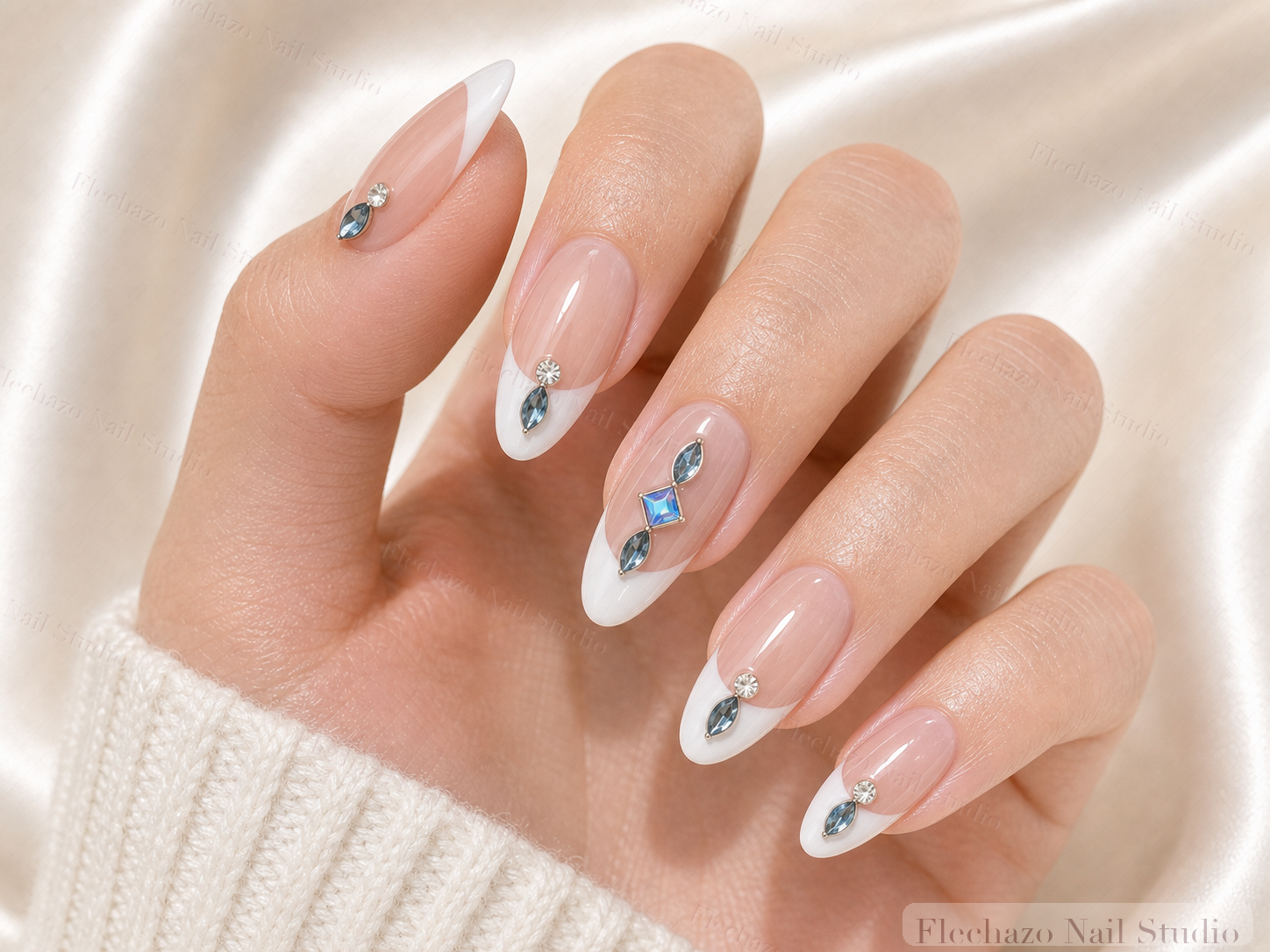 Nude Blue Crystal Minimalist Press-On Nails worn on a model hand