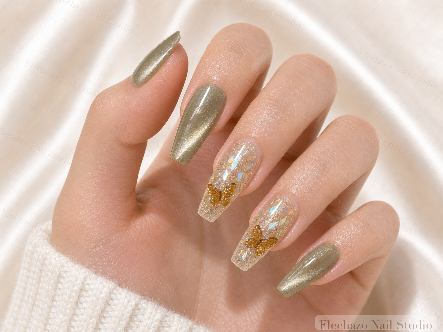 Sage Green Gold Leaf Shimmer Press-On Nails worn on a model hand