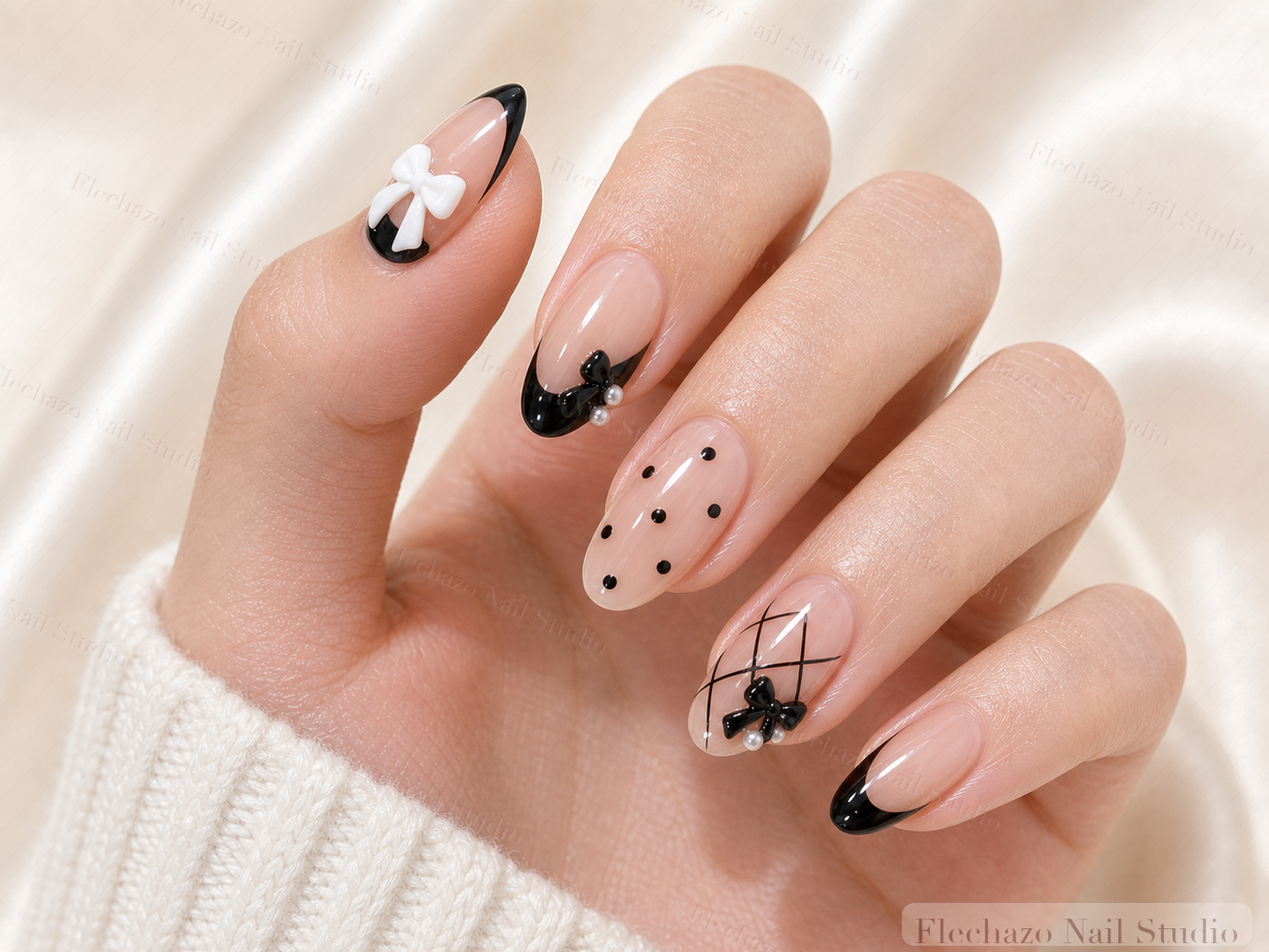 Black Pink Ribbon Graphic Press-On Nails worn on a model hand