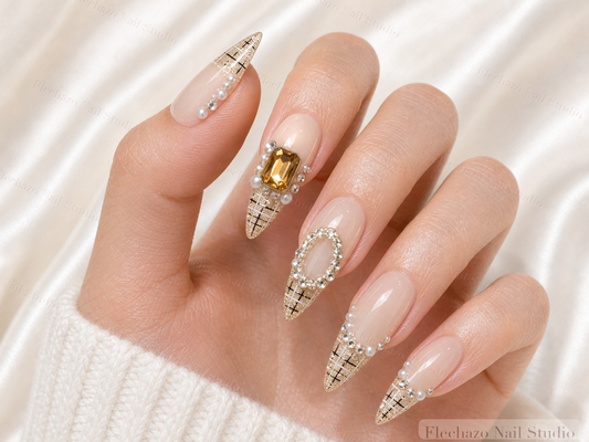 Champagne Plaid Rose Crystal Stiletto Press-On Nails worn on a model hand