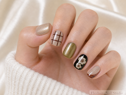 Champagne Shimmer Soft Grid Detailing Press-On Nails worn on a model hand