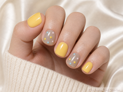 Raised Multicolor Dot Smooth Gel Press-On Nails worn on a model hand